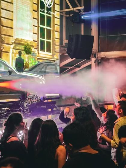 The CO2 gun in action, blasting the crowd with smoke and energy. It's an amazing tool to hype everyone up during a big drop.