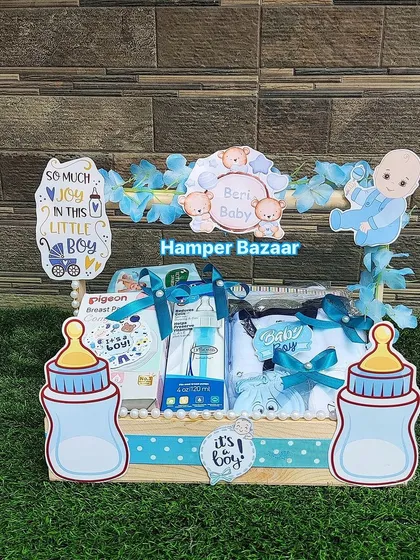 If you've already bought gifts, we can pack them for you! This hamper was created using client-provided baby essentials.