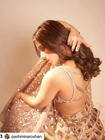 Another beautiful angle of Pashmina Roshan's hair, showing the soft waves and healthy shine.