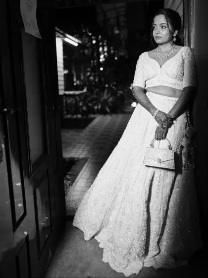 Another artistic black and white shot of the bride, looking elegant and ready for her reception.
