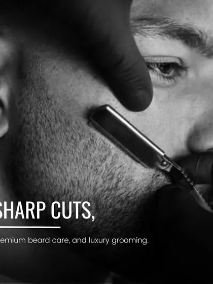 Sharp cuts, premium beard care, and luxury grooming. This close-up shot of a razor defining a beard line showcases our commitment to precision and the art of the perfect shave.