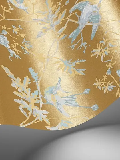 A close-up of the exquisite Hummingbirds design. The shimmering gold background and delicately printed birds showcase the splendor and allure of this enchanting new colorway.