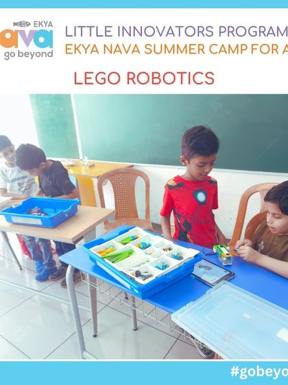 Young campers collaborate on a LEGO Robotics project. This activity teaches them not only the basics of programming and mechanics but also valuable skills in teamwork and communication.