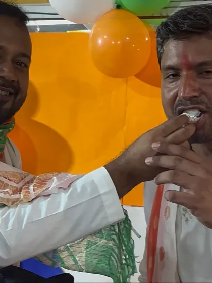 A moment of celebration during our Independence Day event. Our MD Anuj Tiwari shares a sweet with one of our guests.