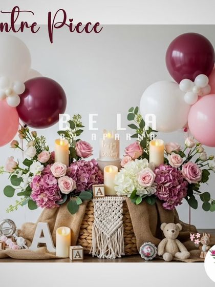 A close-up of a boho-chic centerpiece arrangement. It combines a wicker basket base with florals, candles, and balloons, showing how I mix different textures and elements for a unique, personalized decor style.