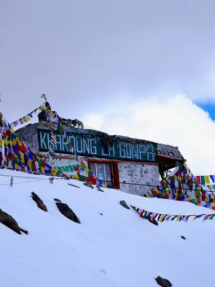 The Khardung La Gompa, a serene sight amidst the extreme challenge of the race.