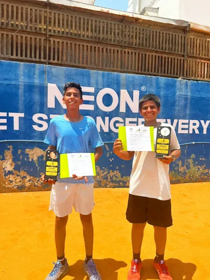 My student Armaan Dua and his partner after winning the Doubles Under-16 category at the Super Series tournament in Ahmedabad. Teamwork and strategy are key components of my doubles coaching program.