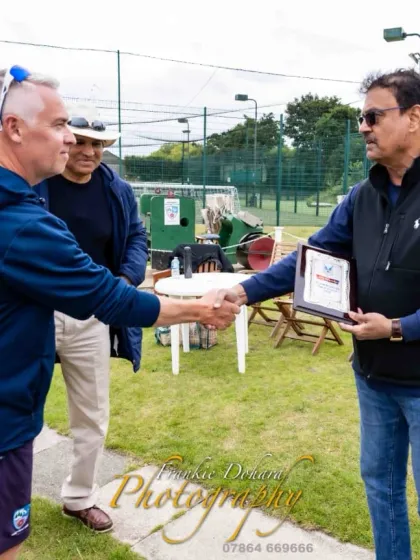 Presenting a memento at the Ainsdale Cricket Club prize distribution function. Building relationships and showing respect for our host clubs is an important part of the touring experience.