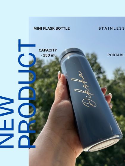 Introducing our new mini flask bottle. This 250 ml stainless steel flask is portable, chic, and perfect for carrying your coffee or tea in style. We'll add your name in a beautiful script font.