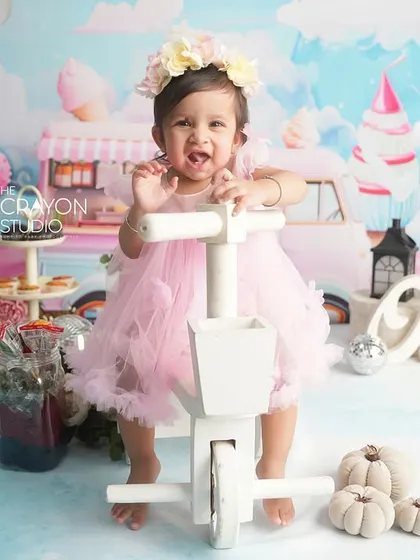 The first birthday is a whirlwind of joy. This Candyland theme captures the pure, sweet excitement of turning one, complete with a custom backdrop, props, and plenty of room for happy wiggles.