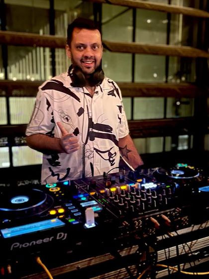 Thumbs up from behind the decks at a gig for Social. I enjoy playing at different venues and tailoring my set to match the unique atmosphere of each place.