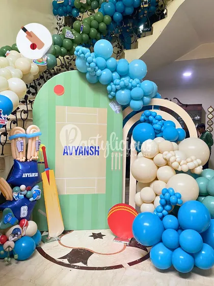 Howzat! A cricket-themed birthday is perfect for any little sports fan. We designed a custom backdrop of a cricket pitch, surrounded by a balloon arch and fun props like a giant bat and wickets.