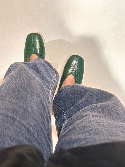 A sneak peek from my perspective, wearing a new pair of green croc-embossed leather loafers. This is part of my process, testing new designs for comfort and style before they ever reach the workshop.