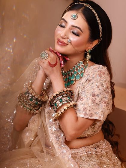 A happy, smiling bride. The makeup is designed to last through all the dancing and celebrations.