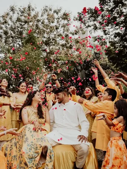 Another angle of the flower petal shower, capturing the sheer joy on everyone's faces.