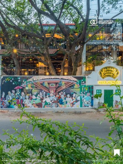 The exterior of Adda 1522, featuring a vibrant mural that captures the spirit of Bangalore. The design integrates the building with its surroundings, making it a local landmark.