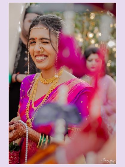The bride's playful wink during the wedding ceremony adds so much personality.
