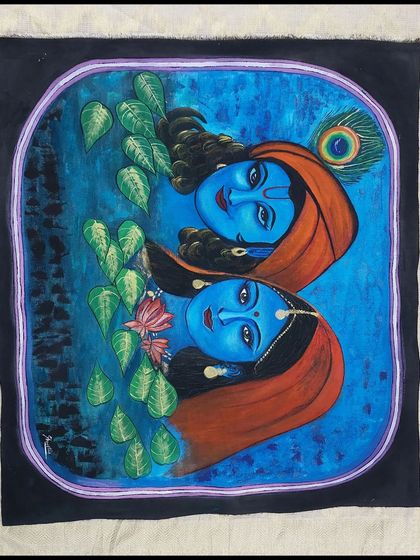 A different style of Radha Krishna painting, with a more modern feel and a deep blue background. This piece is available for sale.