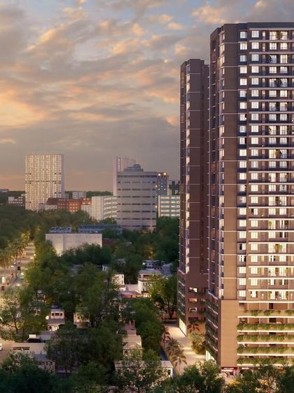 This render shows a residential development in North Mumbai at sunset. The design focuses on providing maximum unobstructed views of the surrounding landscape.
