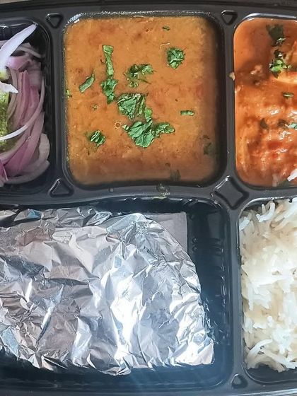 This thali features a delicious soya chaap masala, a dish I make on special request. Paired with dal, rice, and roti, it's a hearty and protein-rich option.