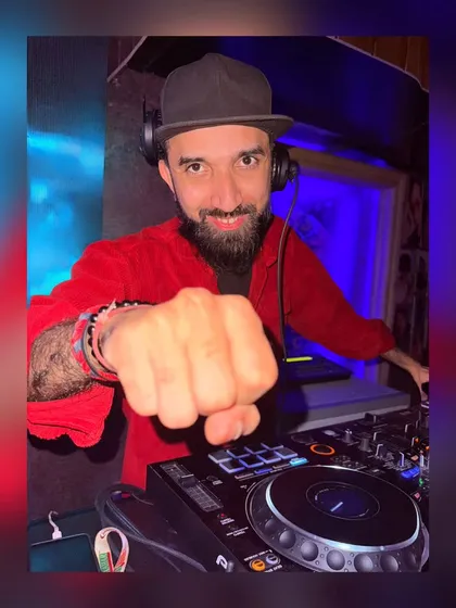 Another shot of me interacting with the crowd from the console. As a party DJ, engagement is just as important as the music.