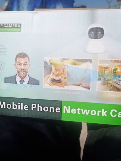 The packaging for the AI HD IP Camera, which highlights its intelligent features like face recognition and wide-angle lens capabilities.