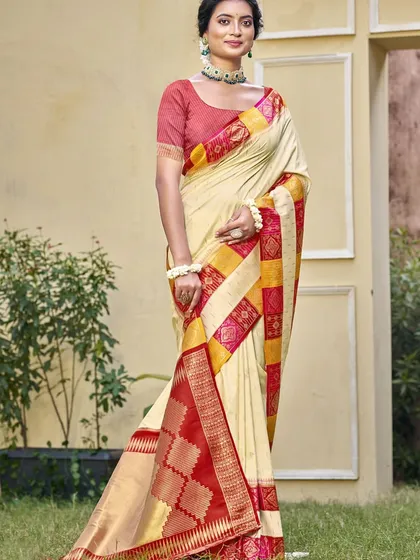 A classic Dupion silk saree is a must-have in every wardrobe. I love how the cream body contrasts with the vibrant red and yellow border, making it a timeless piece for work, pujas, or family gatherings.