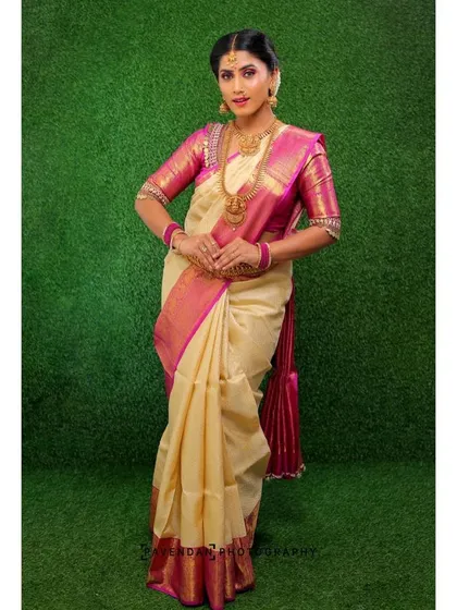 This is the complete picture of a traditional bride. The makeup is designed to harmonize with the rich texture of the Kanjivaram saree and the intricate details of the jewellery, creating a cohesive and regal wedding day look.
