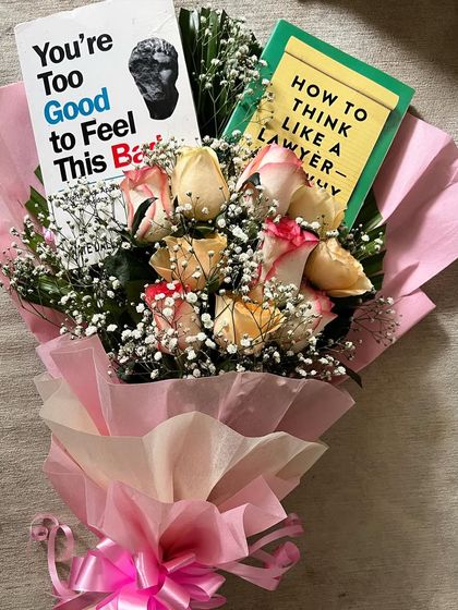 Books and flowers are a delight, and a book bouquet is an especially thoughtful gift. Books are my most effortless companions, and the silent conversations I have with them are precious.