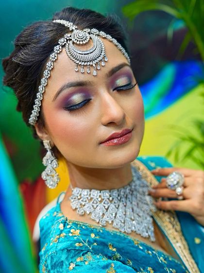 Another angle of the diamond bridal look, showing the intricate details of the makeup and hair. Perfection in every detail is what I teach.