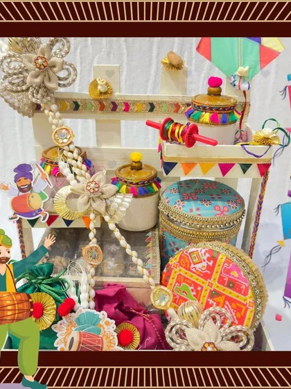 An animated version of my multi-tiered Lohri hamper, capturing the festive energy with dancing figures and colorful kites.
