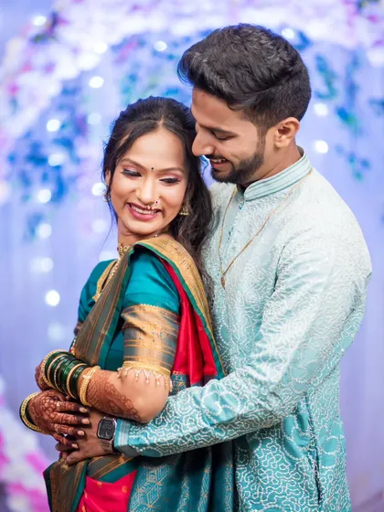 A warm and happy embrace, this photo captures the comfort and joy of a newly engaged couple.