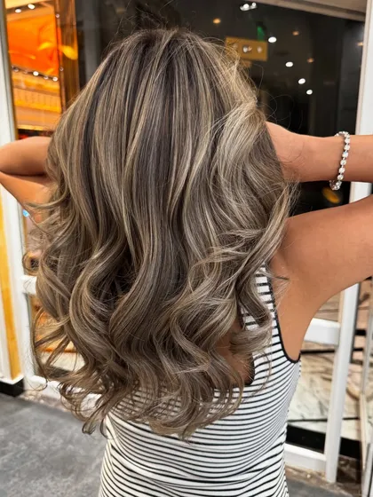 This ash blond balayage is perfect for those who want a modern, edgy, and cool-toned look.