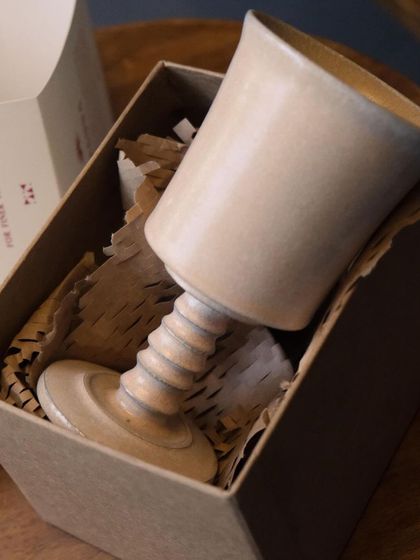 The 'Heccu' goblet, with its intricately carved stem. Each detail was carefully considered to create a piece that is both a functional vessel and a work of art.