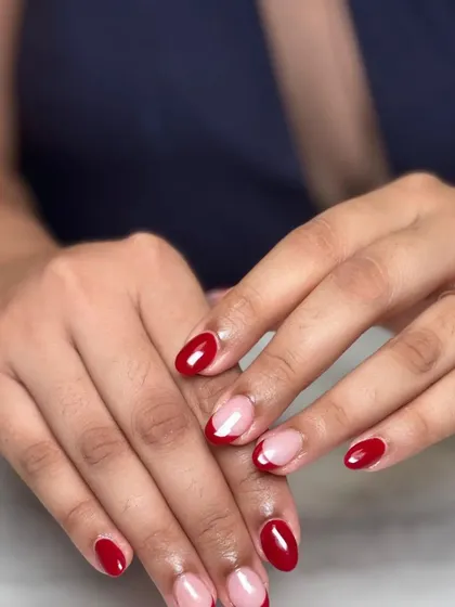 Another shot of this fun and modern red French manicure set. The high-gloss finish makes the red color pop.