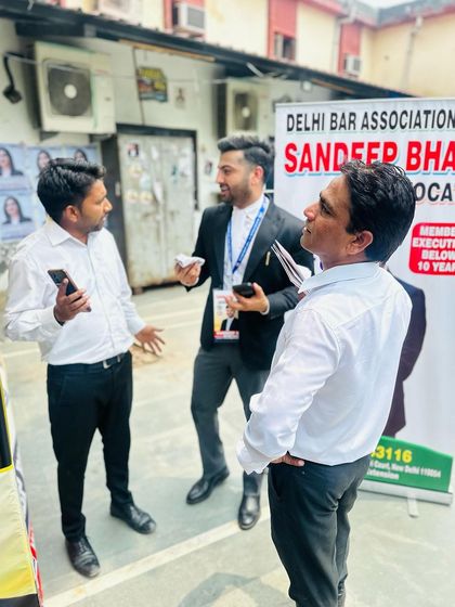 Discussing legal matters with colleagues outside the courtroom.