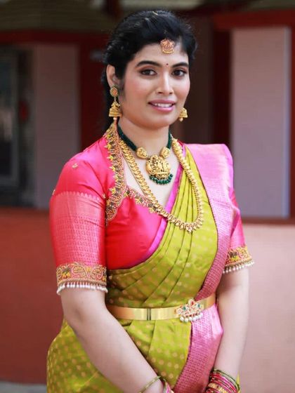 A full portrait of the client, looking radiant for her son's naming ceremony. The makeup is designed to photograph beautifully and highlight her features.