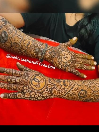 A lovely engagement design featuring the couple's initials 'AM' on one hand and a symbol of two rings on the other, telling the story of their union.