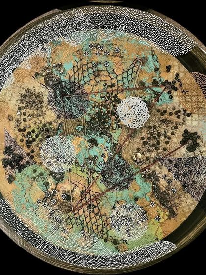 A closer look at one of Nandita Chaudhuri's circular discs, where organic textures and pointillist echoes create maps of unseen emotional terrain.