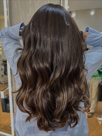 The final result of our Chocolate Mocha Brown color. The hair is full of body, shine, and rich, delicious color.