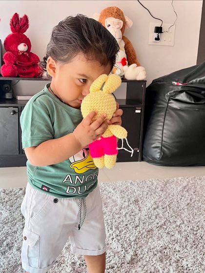 A precious moment between a child and his toy. These are the moments I crochet for.