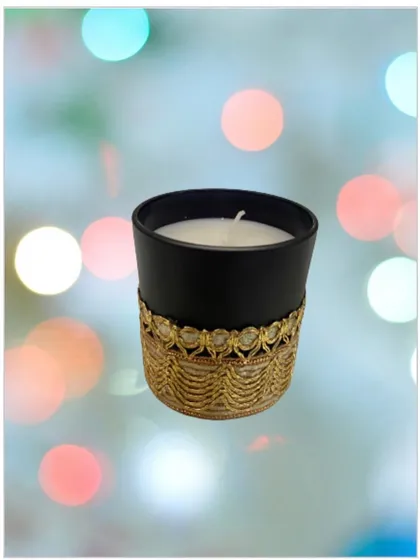 This is one of my premium glass jar candles, featuring a black frosted finish and a decorative golden lace wrap. It's designed to be a beautiful decor item that adds a touch of elegance.