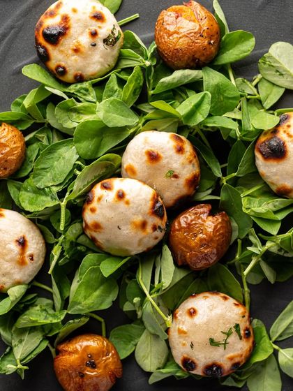 Tandoori boti and baby potatoes served on a bed of fresh fenugreek leaves, another beautiful dish from our curated Christmas menu.