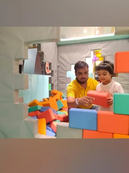 Daddy and daughter quality time, building a colorful wall together with our foam blocks.