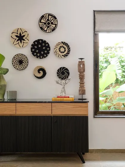 In our Villa Shai project, this custom-designed console and curated decor tell a story of local Goan craft and conscious living. We believe furniture should be more than functional; it should be a collection of stories, textures, and memories that ground a space with soul and a sense of place.
