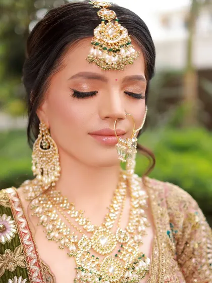 A close-up of her eye makeup. The soft glam look is perfectly blended, creating a beautiful and elegant effect.