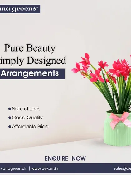 Pure beauty, simply designed. This vibrant pink floral arrangement comes in a stylish green vase, ready to brighten up your room.