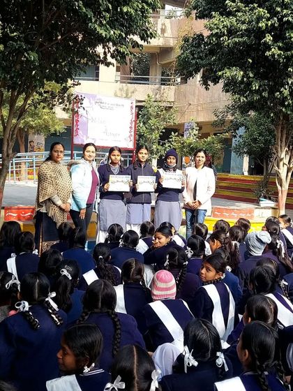 Celebrating the winners of a nutrition-based activity at a government school. Rewarding participation and knowledge helps reinforce healthy habits in a positive way.