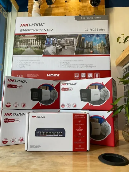 We use trusted, high-quality equipment for our installations. This kit includes a Hikvision Embedded NVR, a multi-port POE switch, and several 4MP IP cameras with built-in microphones, ensuring a robust and clear surveillance system.