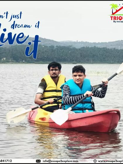 Don't just dream it, live it. Two friends take on the lake in a kayak, ready for whatever adventure comes their way.